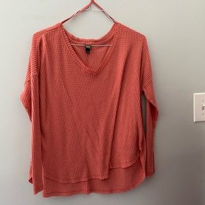 A pink thin sweater